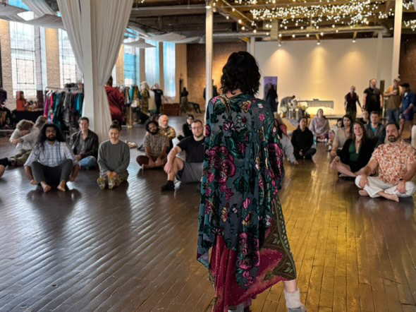 Marisa Skolky leading a group wellness session at a corporate event